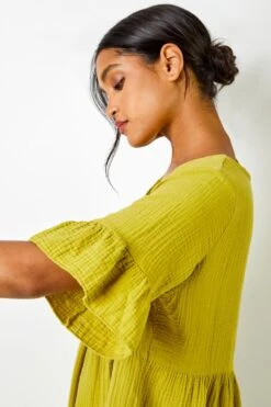 Pea Green Textured Tiered Smock Dress -Dress Haven Sales Store 07b1d2fc 701e 4deb bcc6 232d6eb285e9