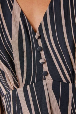 Black Abstract Print Wrap Midi Dress 11 Black Abstract Print Wrap Midi Dress -Dress Haven Sales Store a8a23fd4 fa3c 4d19 a1d5 1c7ca78e94b9